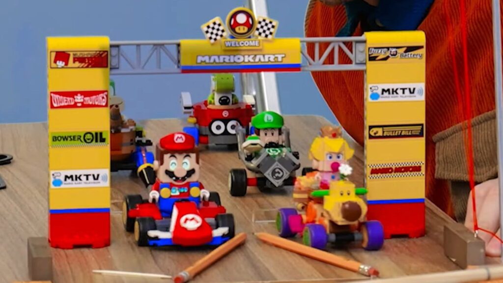 Mario Kart fan creates chain reaction race track with Lego, books and an ironing board