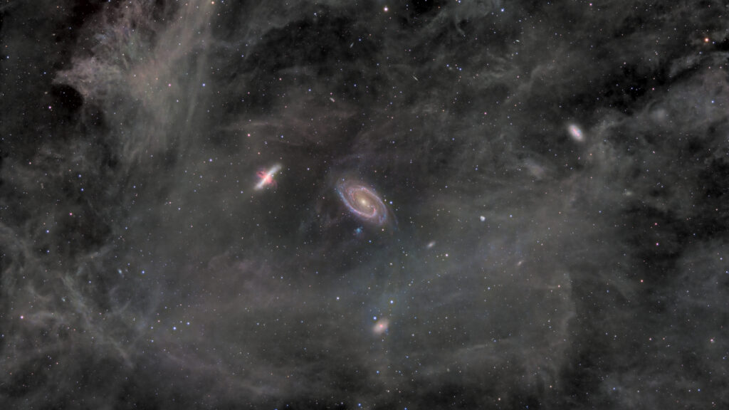 Amateur astronomer captures Cigar Galaxy and Bode's Galaxy swimming in a spectral nebula (photo)