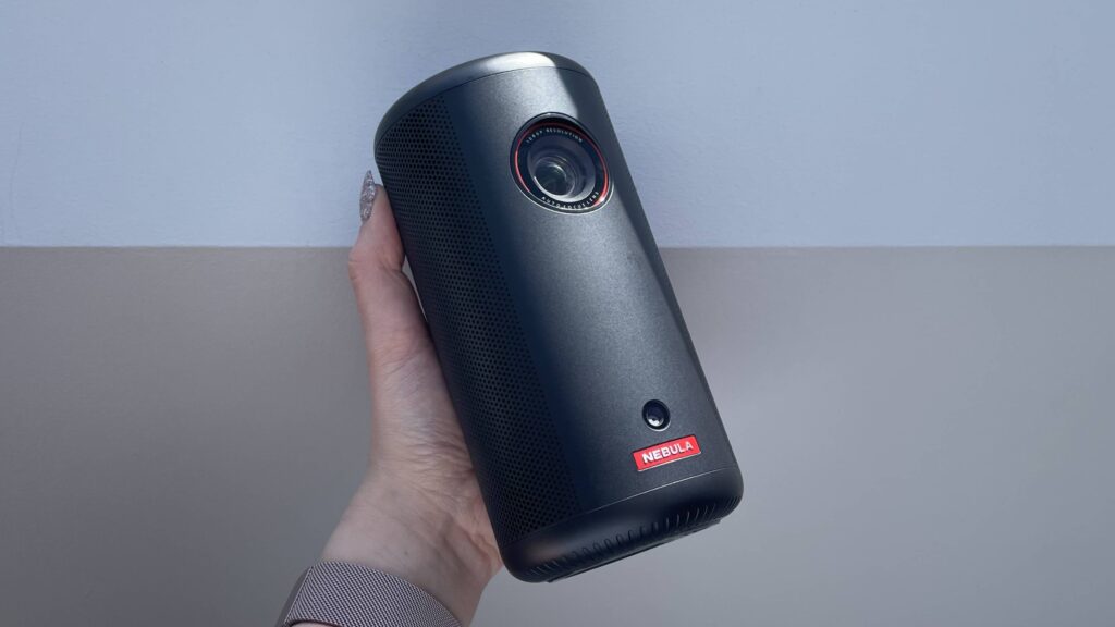 I chose this portable projector over a TV for my bedroom, and I love it – here are 3 reasons why, but 1 reason it might not be for you