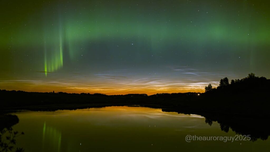 Northern lights and glowing noctilucent clouds collide in a rare night sky show over Alberta (photo)